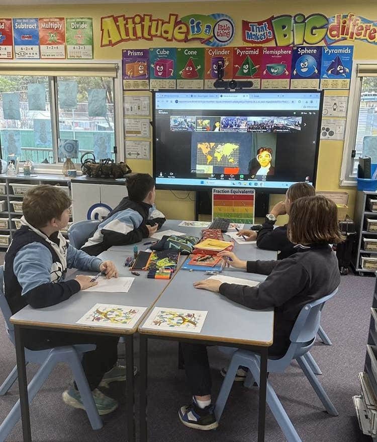 4 Trunkey Public School students engaging in a webinar on the interactive whiteboard