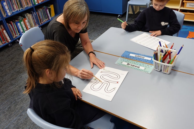 SLSO Karen Brown supporting children during kindergarten transition