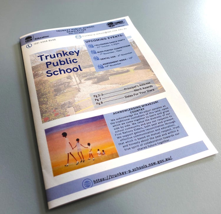 Photo of Trunkey public school newsletter on a blue table